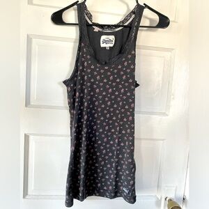 Superdry long camisole with lace trim, pink floral ditzy print on navy. Medium.